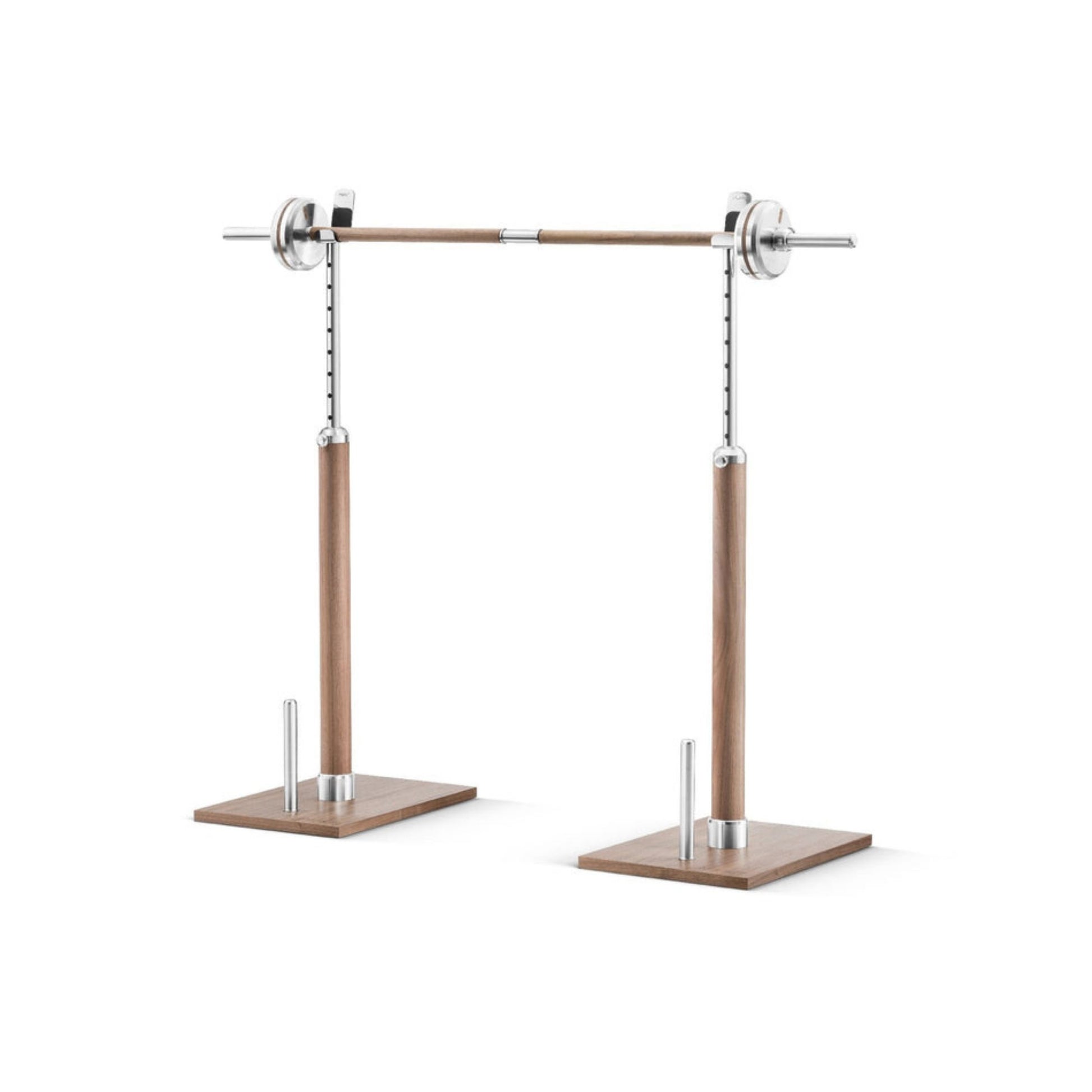 A barbell set on a sleek wooden stand, made of Walnut, Oak, or Ash wood and solid stainless steel. Total maximum weight capacity 70kg. Pent by Cycling Bears