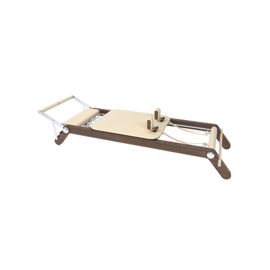 A luxury wooden Pilates reformer with leather padding and adjustable foot bar, made with natural wood and white premium Italian leather, PENT. PILATES - REFORMER