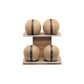 PENT MOXA weighted leather medicine balls on a horizontal stand, customisable in different weights. by Cycling Bears