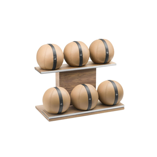 Sideview of six brown leather medicine balls with black accent leather, arranged on two shelves made of natural walnut wood. PENT. MOXA Set Ultimate - Set of 6 Medicine Balls on Horizontal Wooden Stand