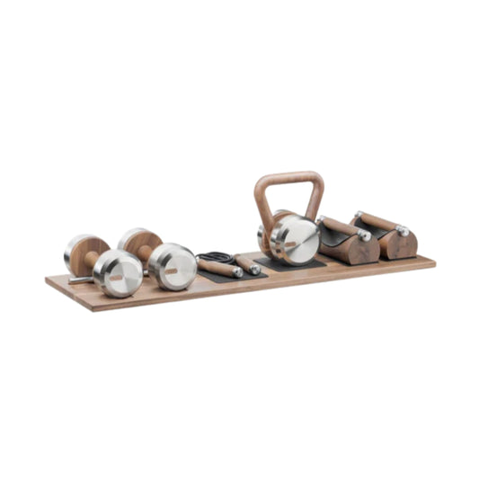 Luxury gym equipment set with push-up bars, a kettlebell, set of dumbbells, and a jumping rope on a premium wood stand. With wood materials in natural walnut and stainless steel. PENT. DEHA - Set of Fitness Equipment