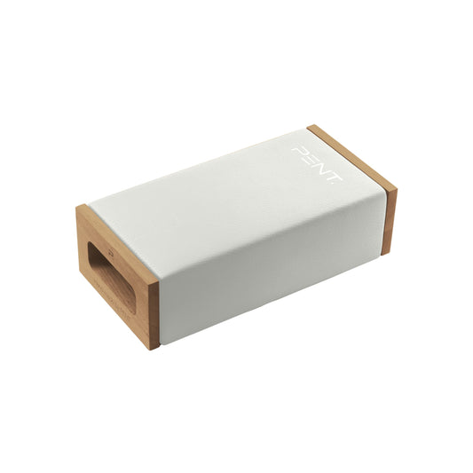 A handmade yoga block with a classic construction of ash wood wrapped in a luxurious Italian white leather. PENT. x Cycling Bears KOHA - Luxury Yoga Block