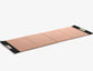 A luxurious exercise mat in pink and black premium Italian leather, suitable for yoga or fitness workouts. PENT. MATA